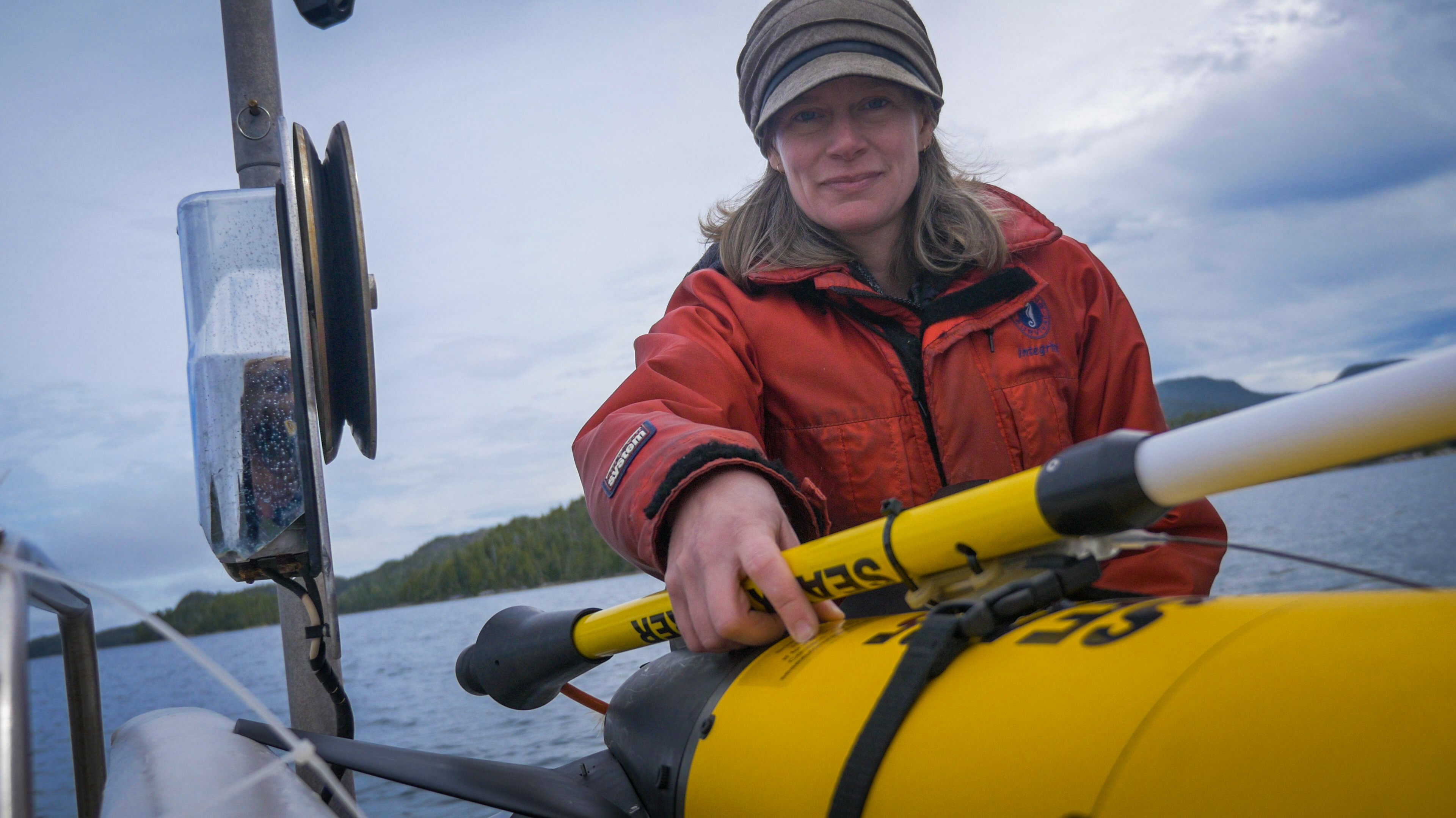 Boats and boating--Equipment and supplies, Sky, Cloud, Workwear, Smile, Water, Lifejacket